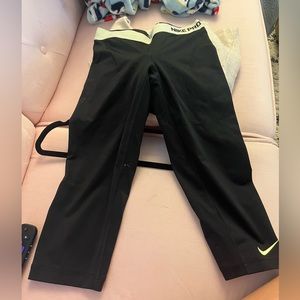 Bundle of athletic tops and bottoms including Nike and aritizia